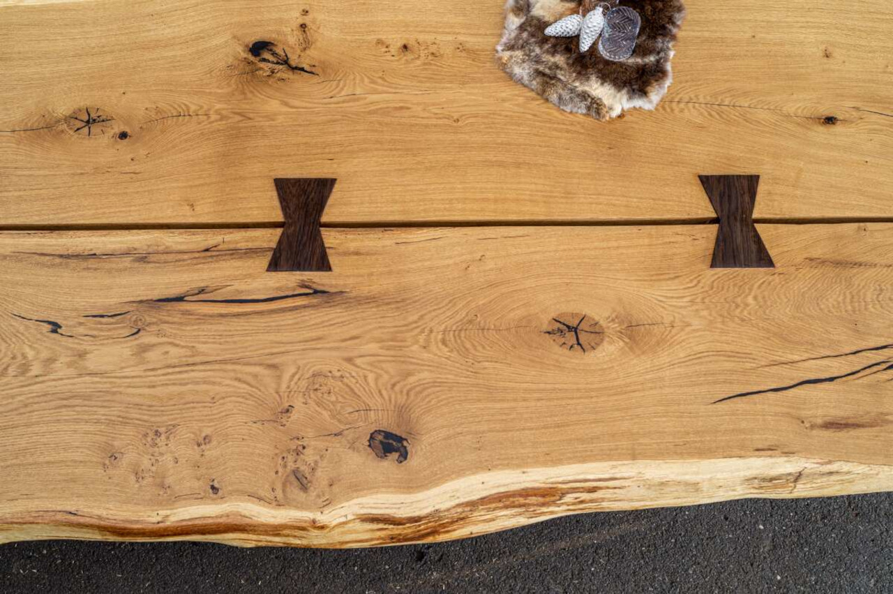 Oak dining table with natural grain and live edge
